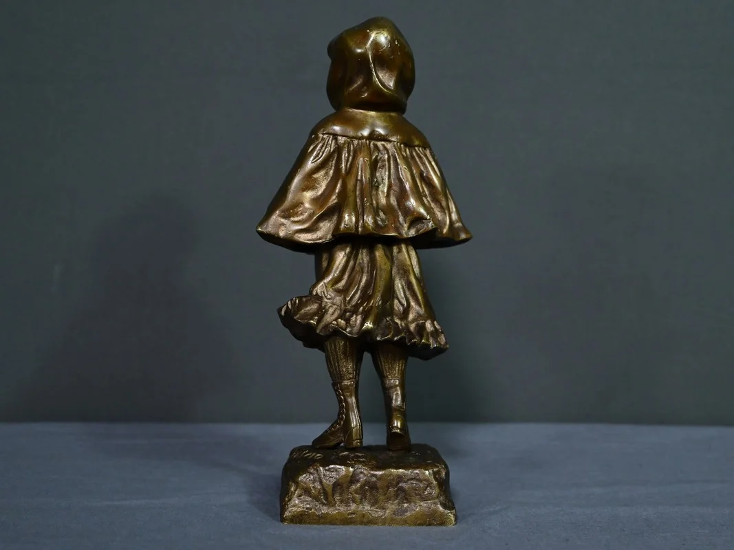 Bronze « L’Ecolière », signé Tremo – Début XXe