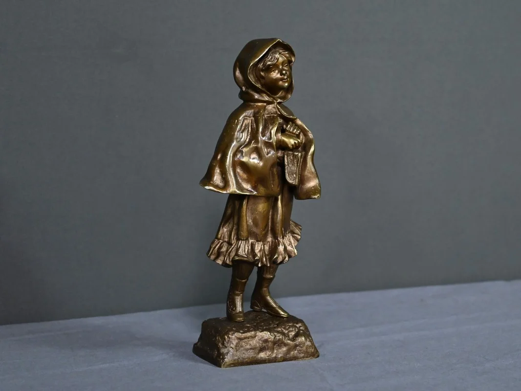 Bronze « L’Ecolière », signé Tremo – Début XXe