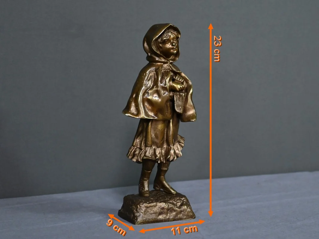 Bronze « L’Ecolière », signé Tremo – Début XXe