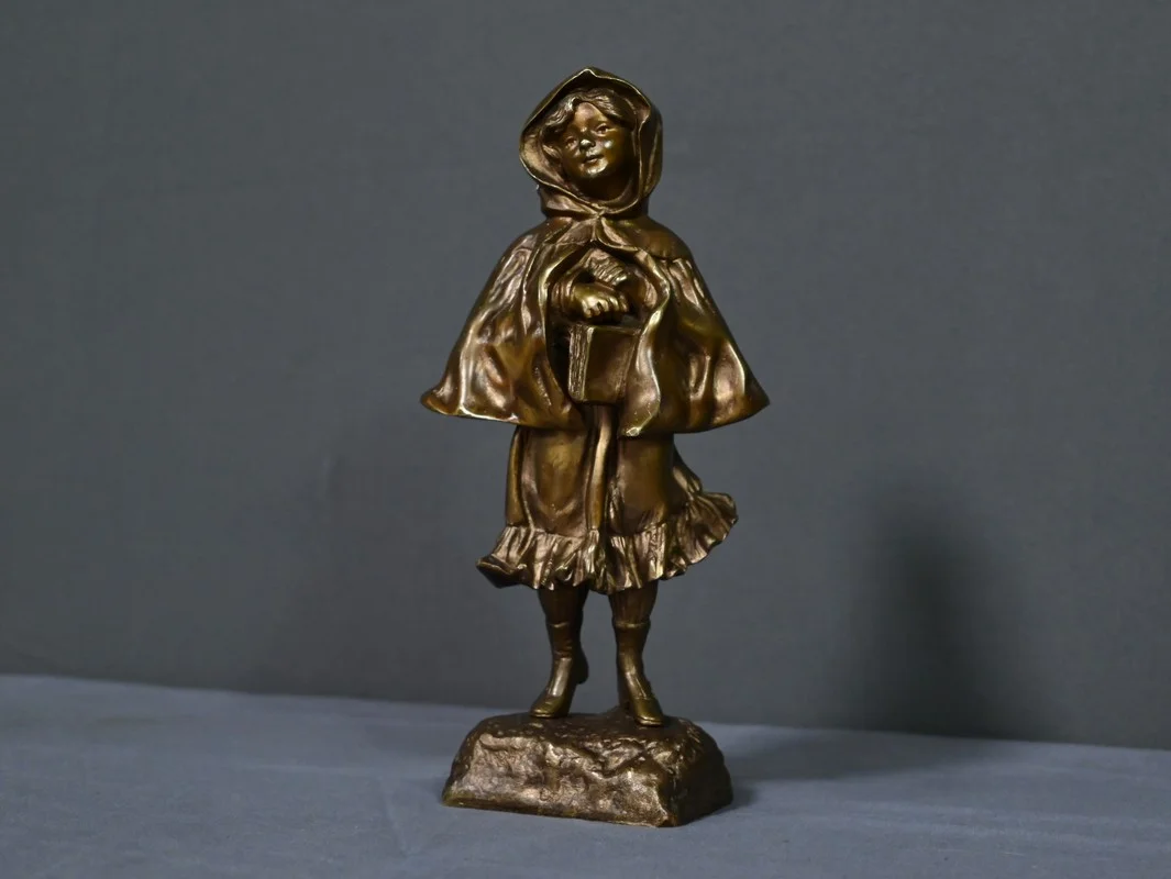 Bronze « L’Ecolière », signé Tremo – Début XXe