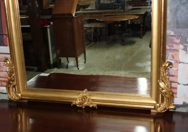 Miroir doré "Rocaille" XIXe