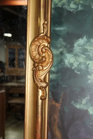 Miroir doré "Rocaille" XIXe