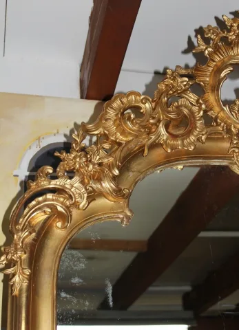 Miroir doré "Rocaille" XIXe