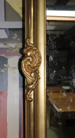 Miroir doré "Rocaille" XIXe