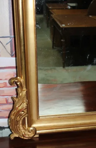 Miroir doré "Rocaille" XIXe