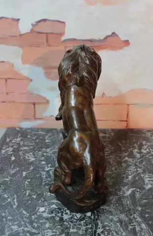 LEÓN DE SPELTER POR T. CARTIER