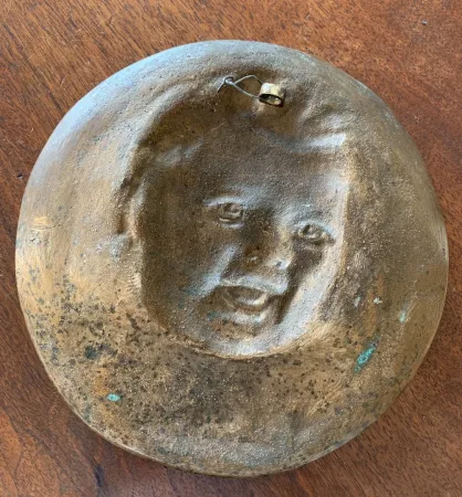 Portrait d un jeune enfant en bronze