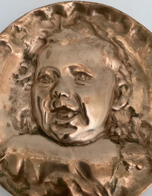 BRONS PORTRET VAN EEN KIND