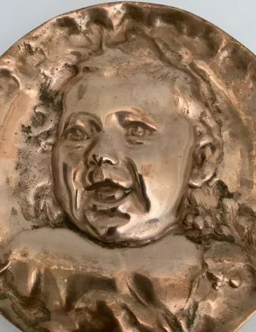 Portrait d un jeune enfant en bronze