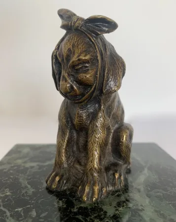 La dent de sagesse , sujet en bronze