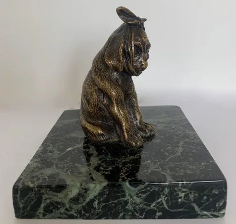 La dent de sagesse , sujet en bronze