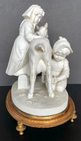 la Traite De La Chèvre , Groupe En Biscuit