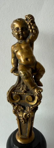 Small bronze sculpture of a cherub