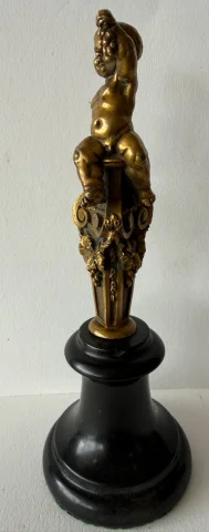 Small bronze sculpture of a cherub