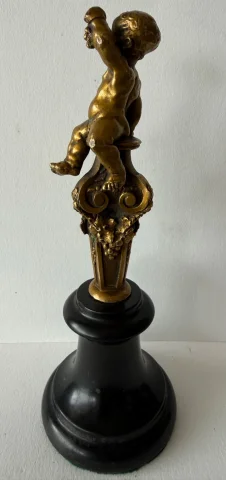 Small bronze sculpture of a cherub
