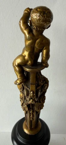 Small bronze sculpture of a cherub