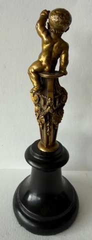 Small bronze sculpture of a cherub