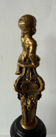 Small bronze sculpture of a cherub
