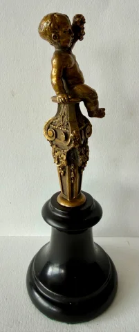 Small bronze sculpture of a cherub