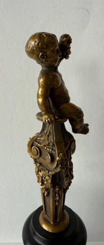 Small bronze sculpture of a cherub