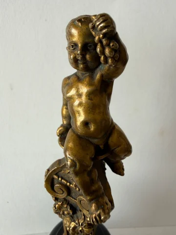 Small bronze sculpture of a cherub