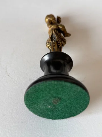 Small bronze sculpture of a cherub